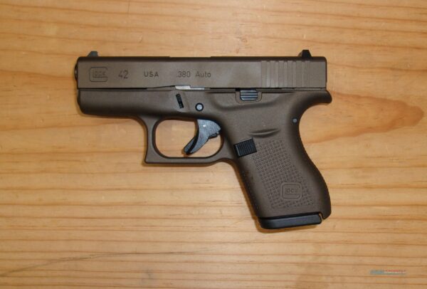 Side view of Glock 42 .380 Auto pistol with black polymer frame, designed for concealed carry and personal defense